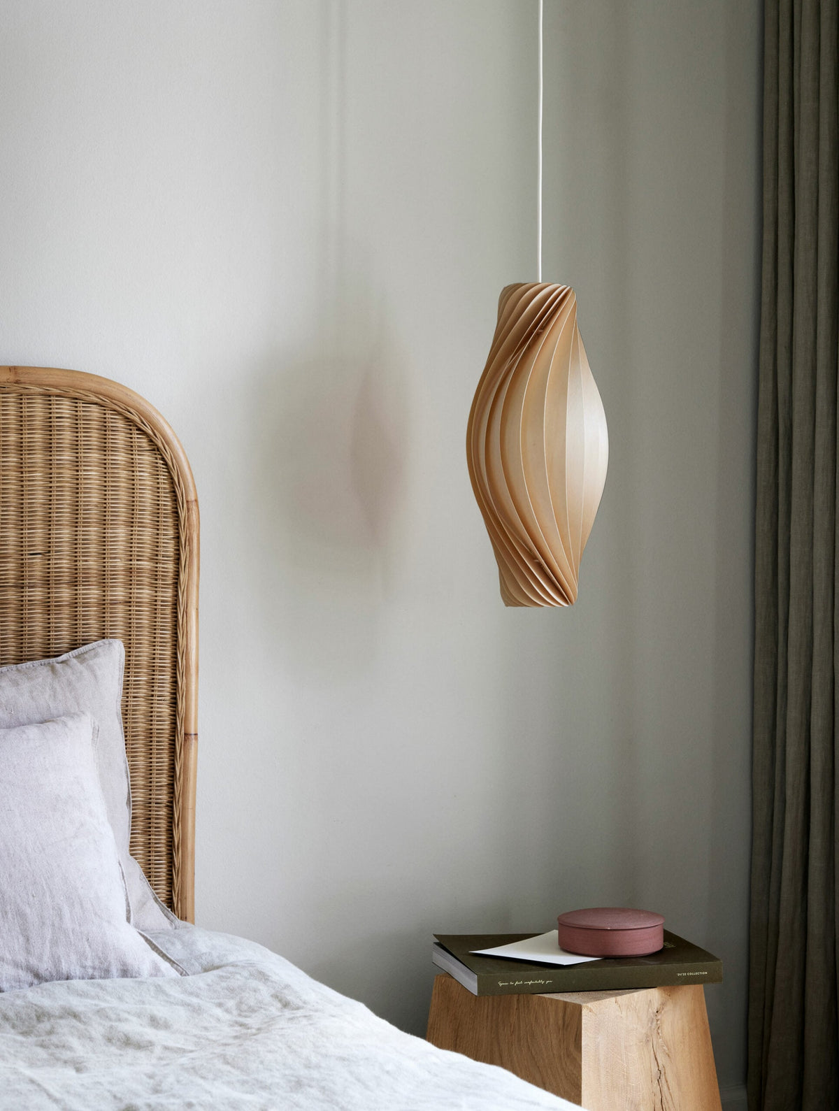 Tom Rossau No.111 pendant light – beside a bed