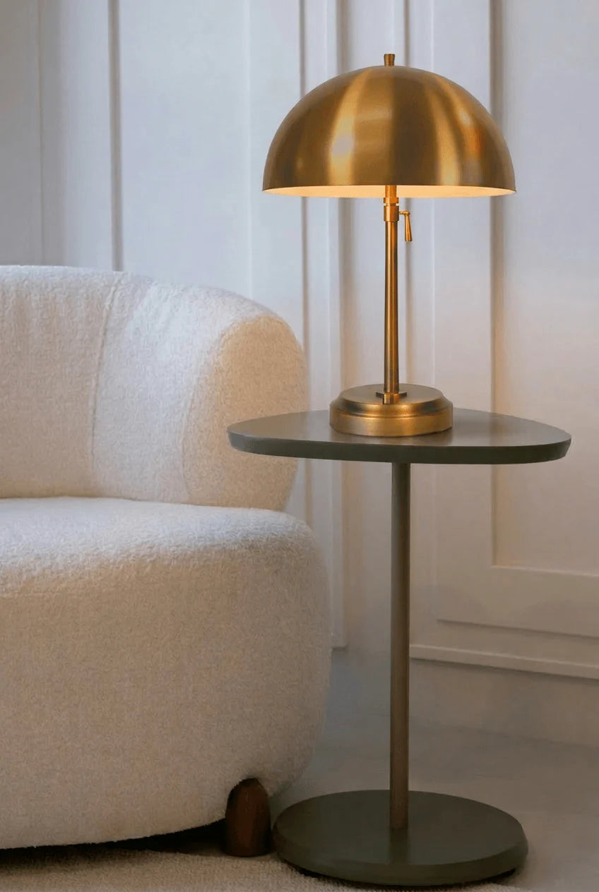 Rechargeable indoor table lamp with classic brass base and linen shade
