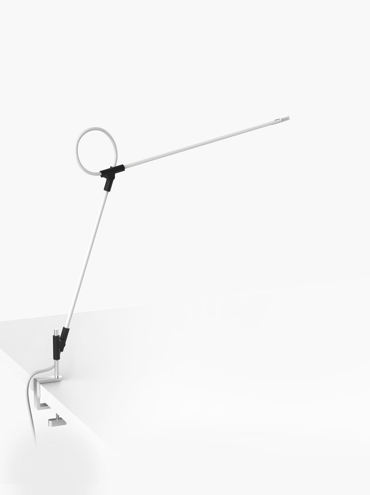 Superlight clamp lamp in white on a plain background