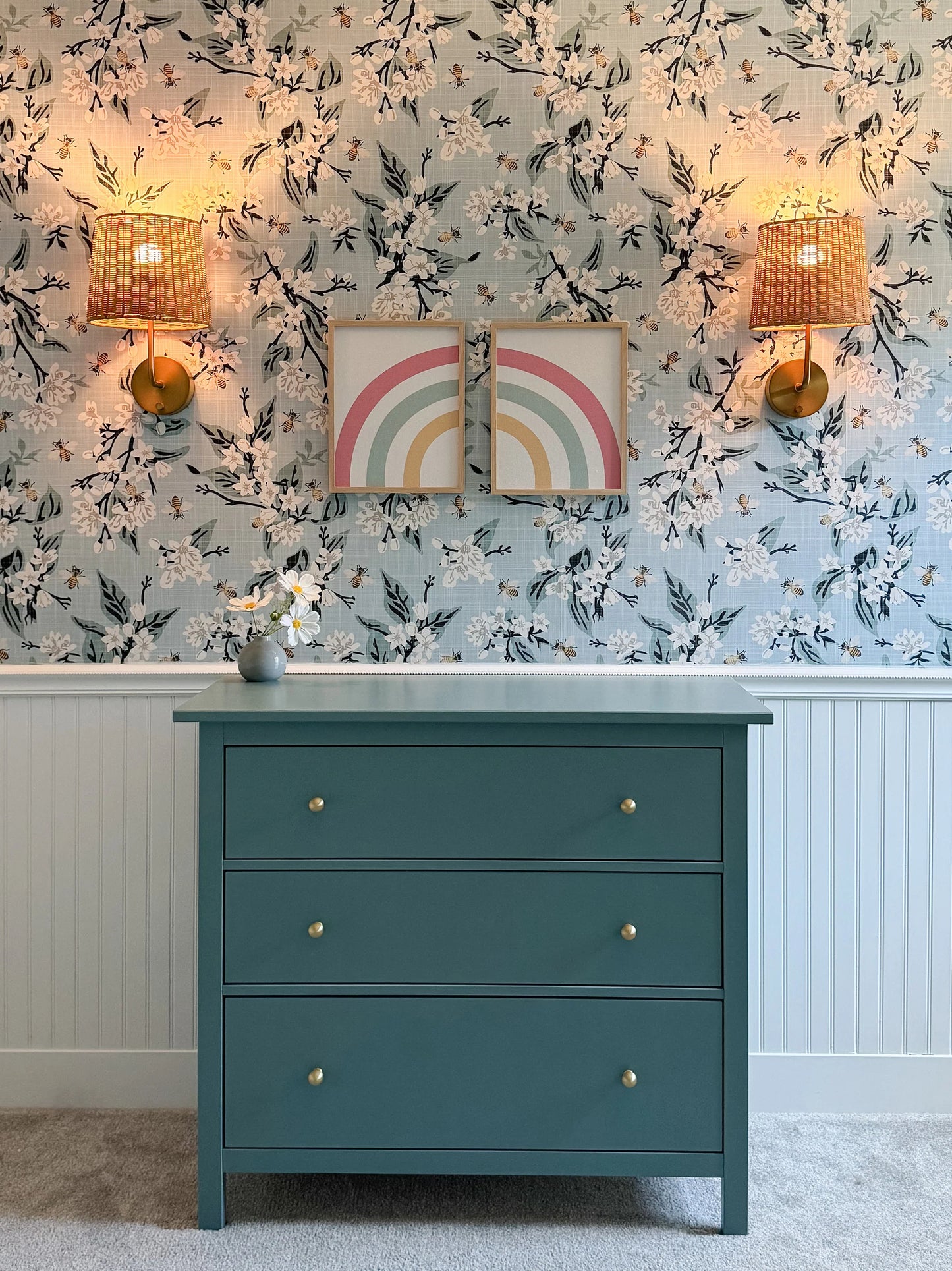 mily Cordless Wall Sconce Antique Brass with natural rattan shade mounted on wall