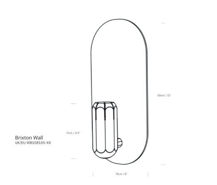 Elegant Innermost Brixton copper and graphite up-light, ETL listed, enhancing the design of a high-end boutique hotel room.