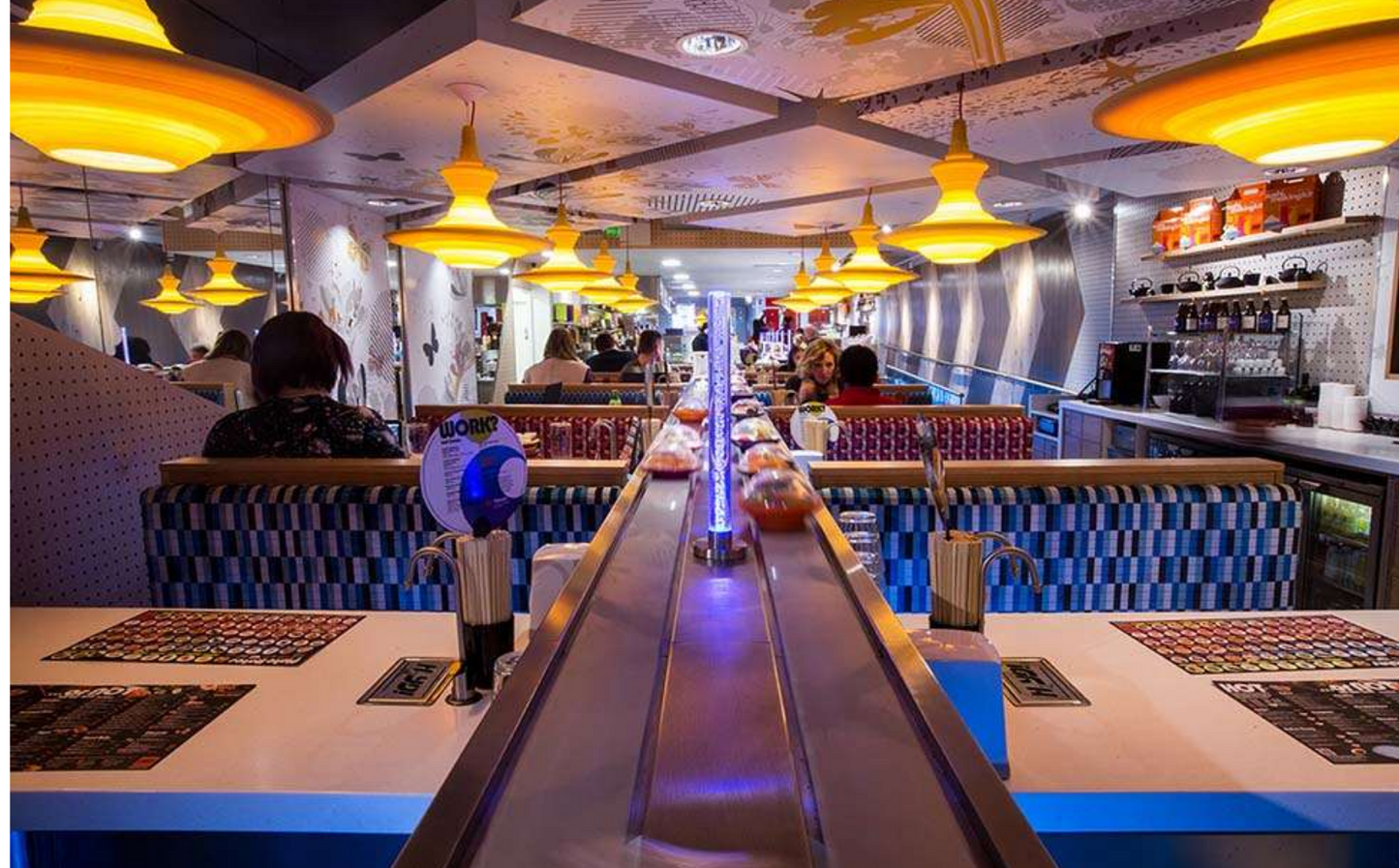 Innermost Stupa Yellos Pendant Light installed in a restaurant