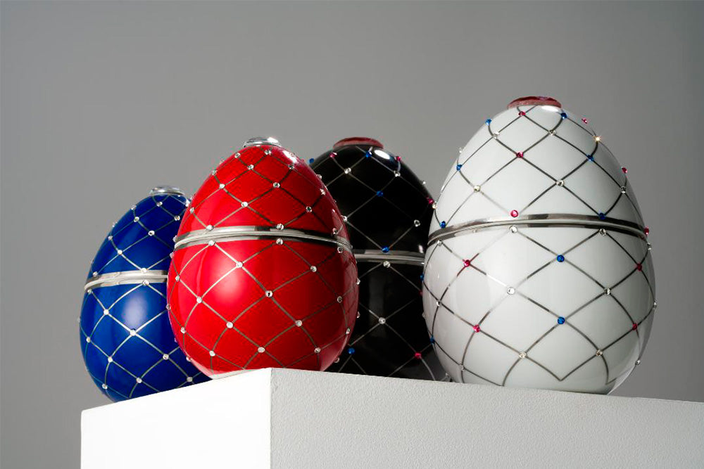 Bois de Russie 450 g ceramic egg candle by Ladenac Milano, Blue, red, black and white eggs together