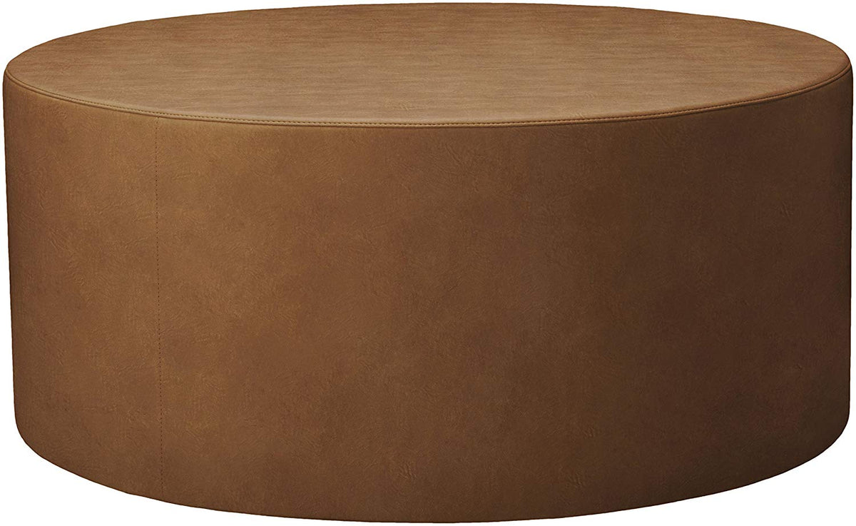 Cognac Puck round ottoman, studio view