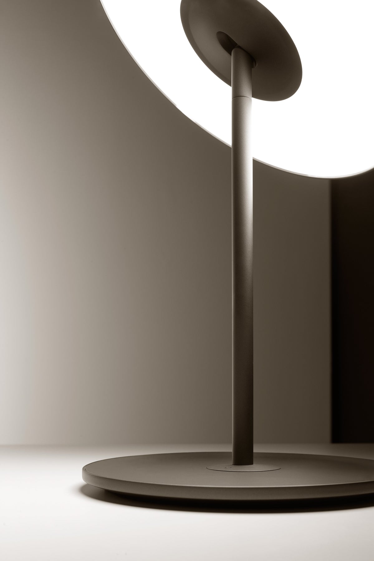 Underside of the Circa lamp base showing the cord exit