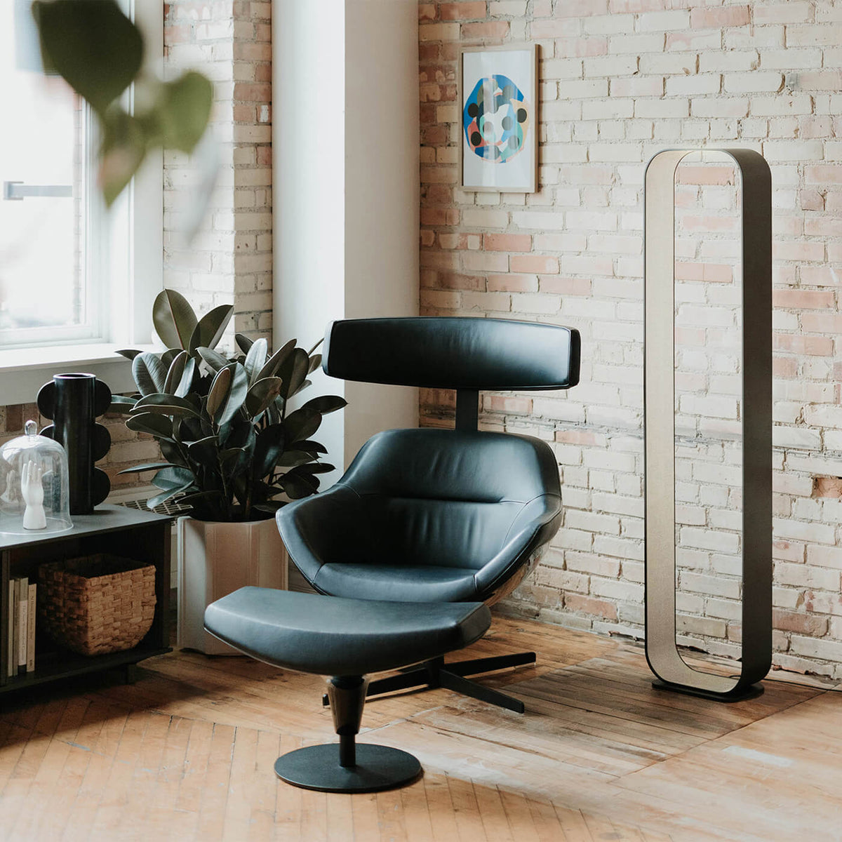 Contour slim floor lamp beside furniture in a magazine-style interior
