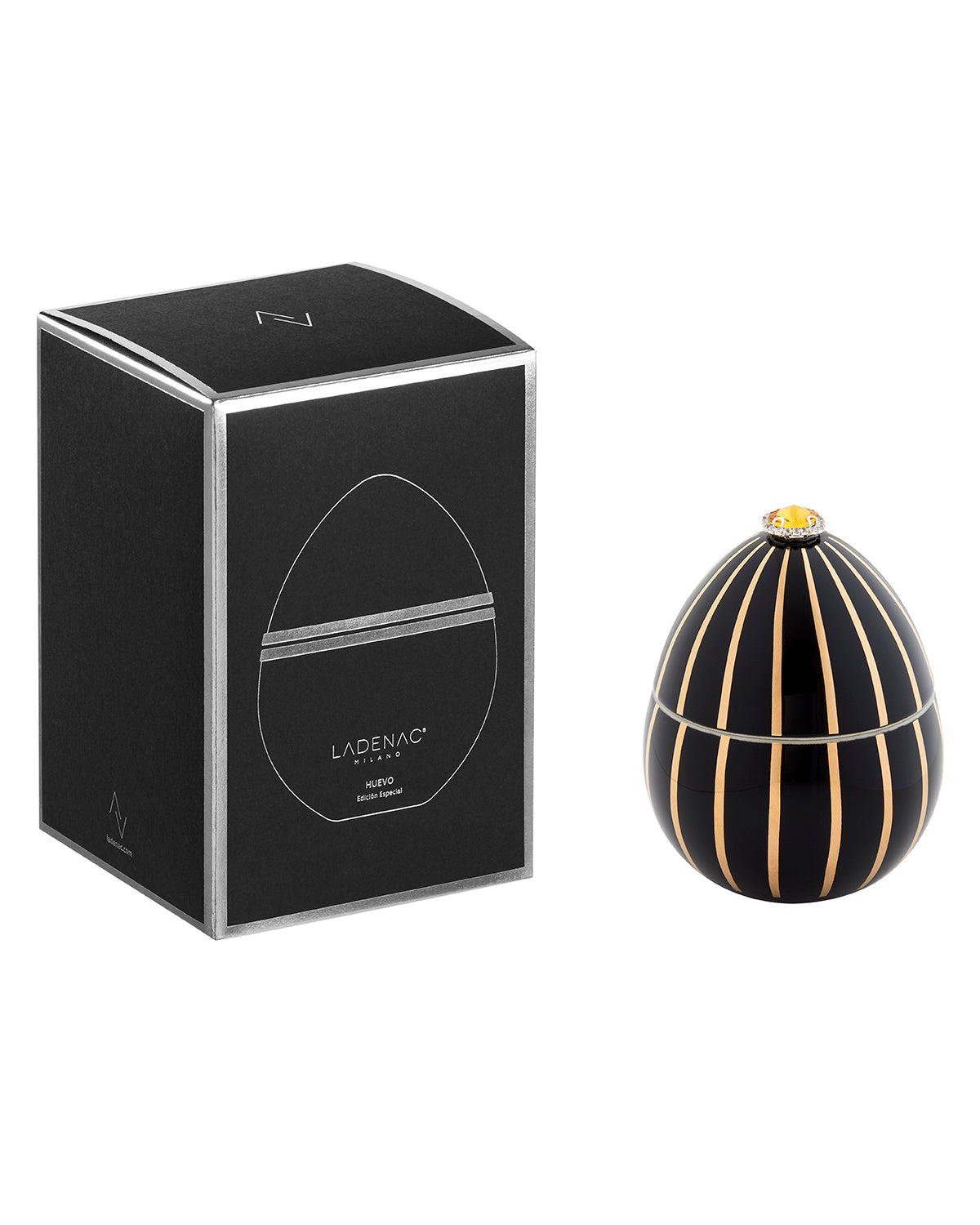 Bois de Russie 220 g ceramic egg candle by Ladenac Milano, Black Gold Stripes egg beside its black gift box