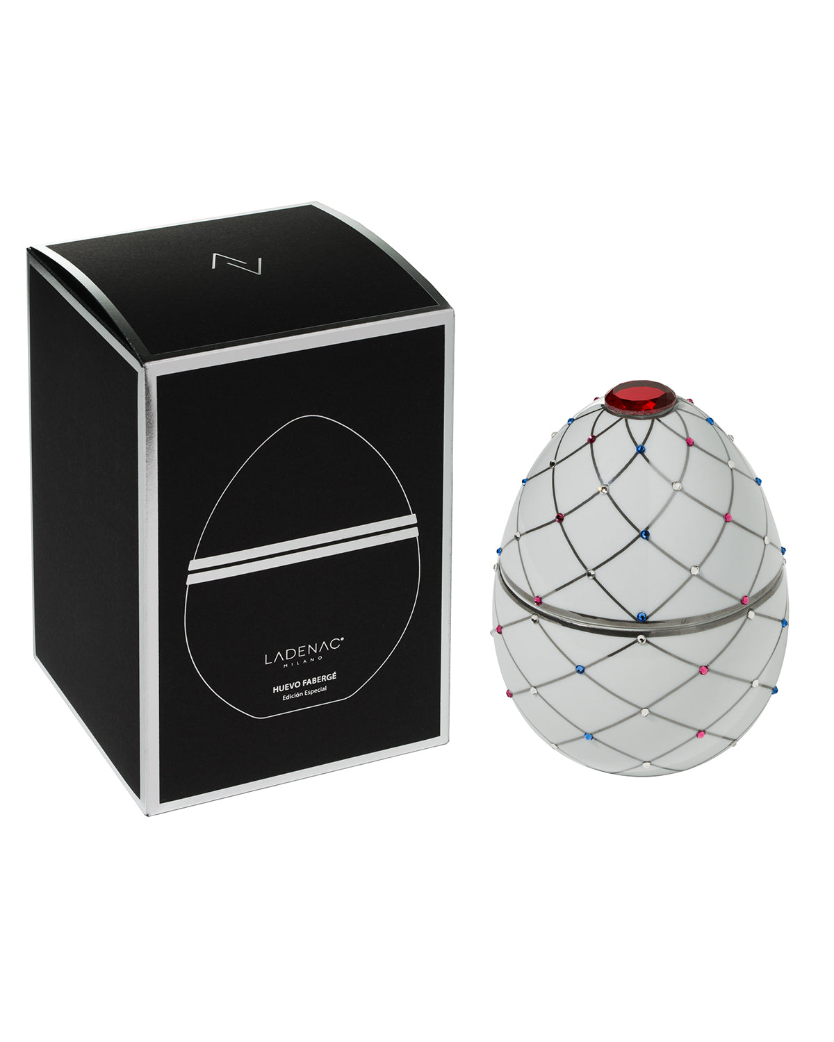 Bois de Russie 450 g ceramic egg candle by Ladenac Milano, White Silver Stripes egg beside its black gift box