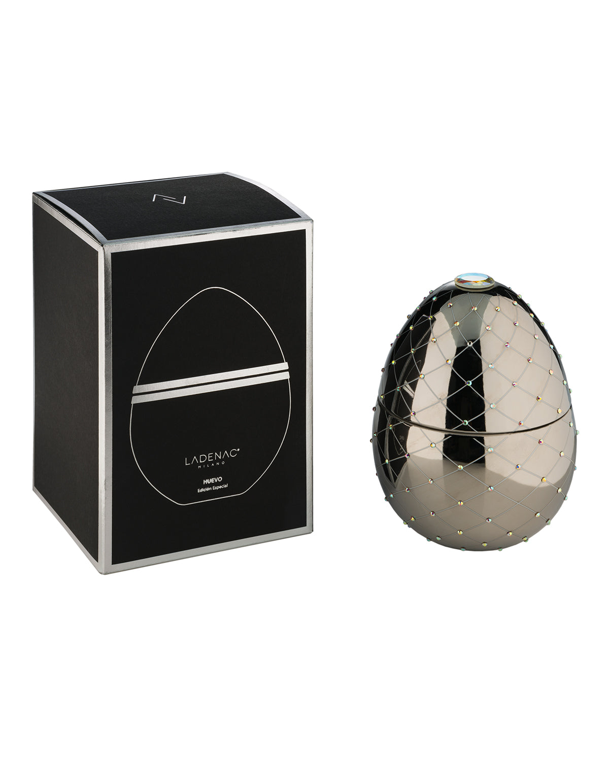 Bois de Russie 450 g ceramic egg candle by Ladenac Milano, Silver egg beside its black gift box