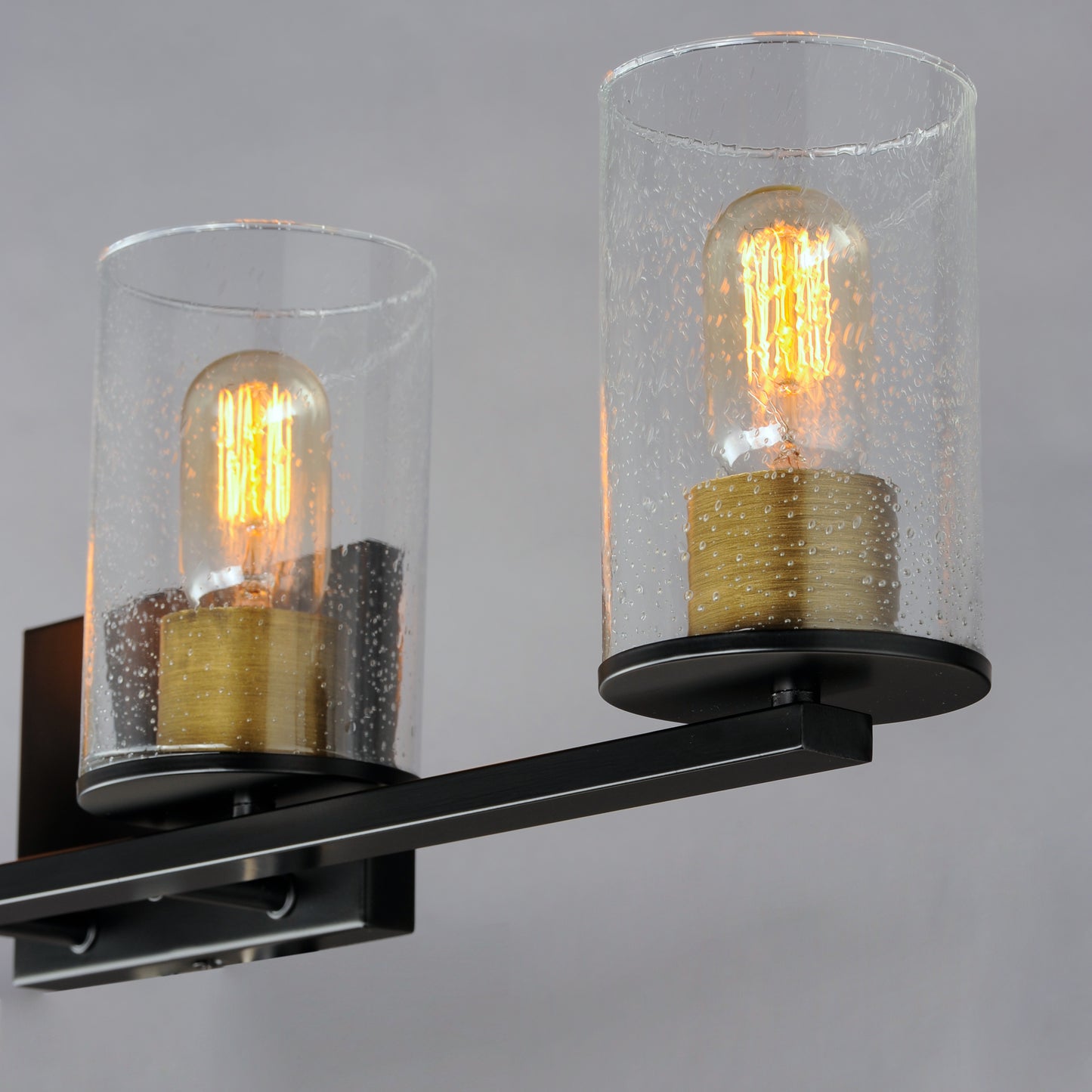 Sleek 4-Light Bath Vanity Antique Brass/Black by Maxim Lighting
