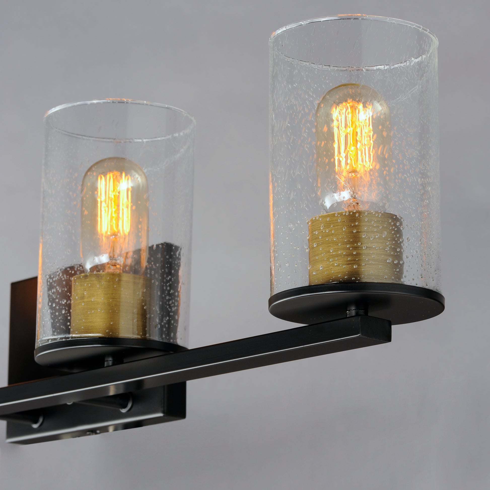 Sleek 4-Light Bath Vanity Antique Brass/Black by Maxim Lighting