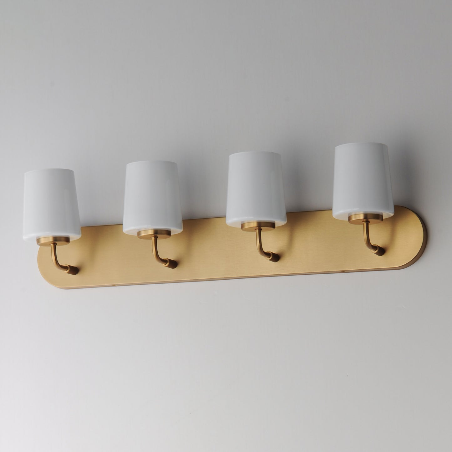 Durham 4-Light Strip Bath Vanity Natural Aged Brass by Maxim Lighting