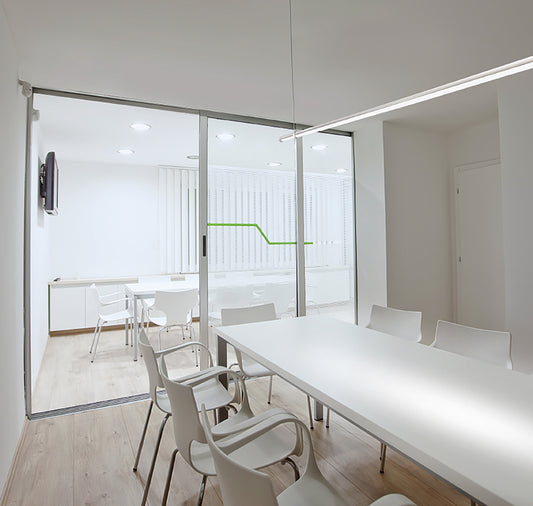 Egoluce Lancia LED linear pendant in a room setting