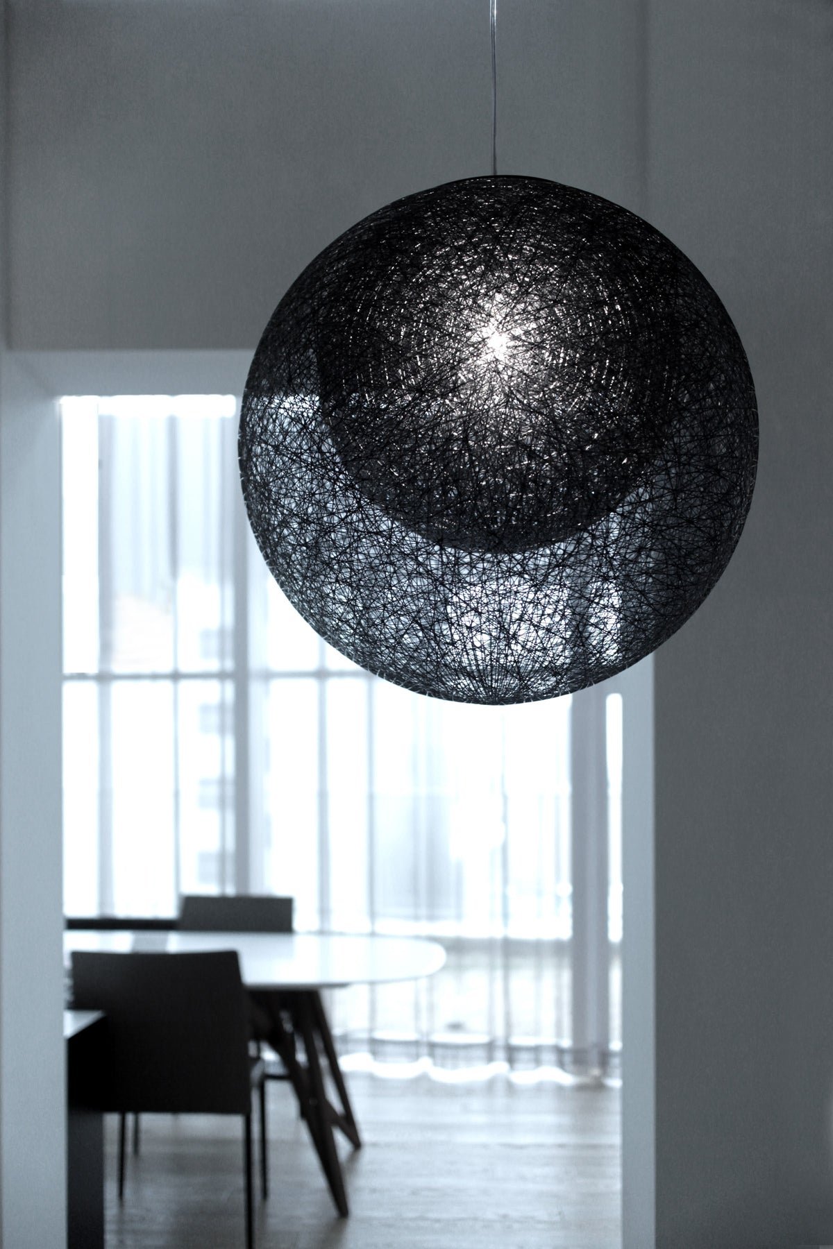 Yamagiwa Mayuhana 2 Sphere Pendant Light in an interior 6