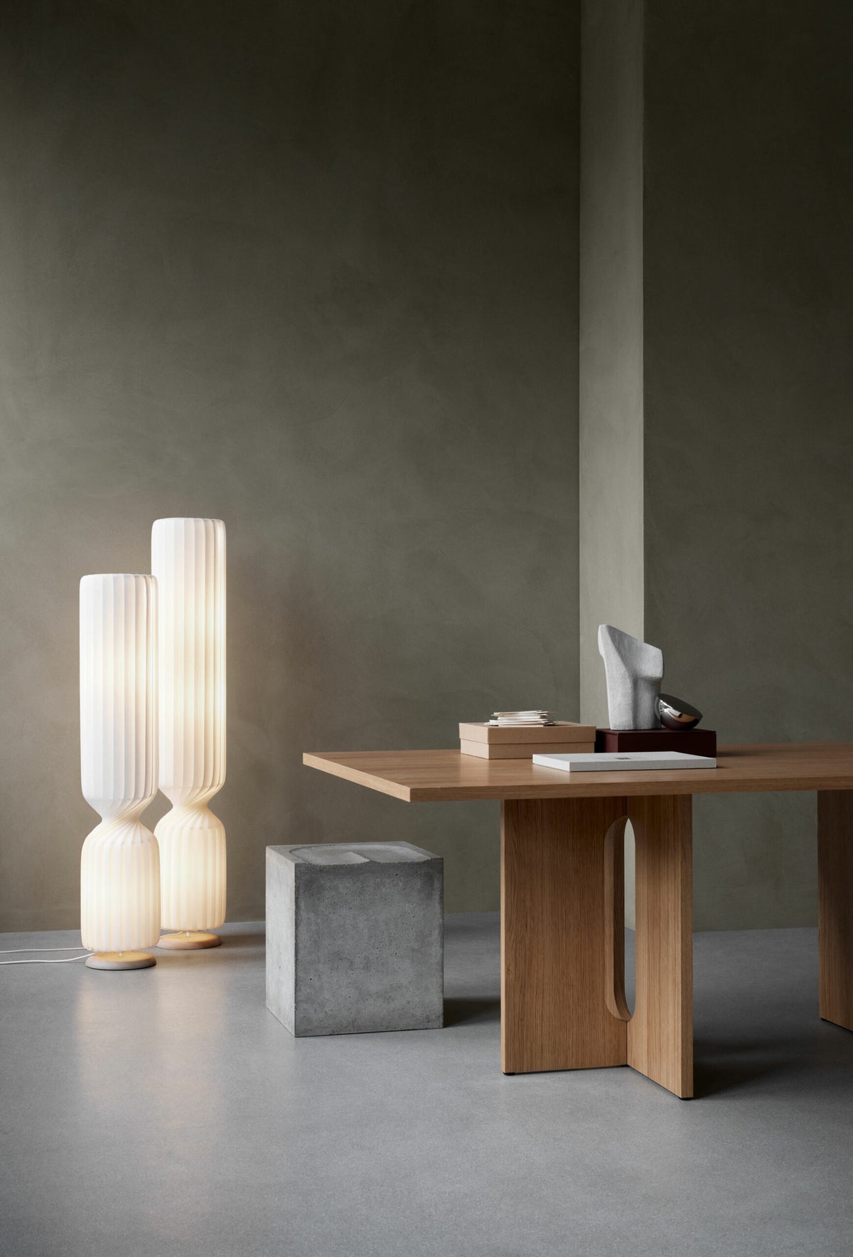 Tom Rossau TR41 floor lamp – lit beside a sofa