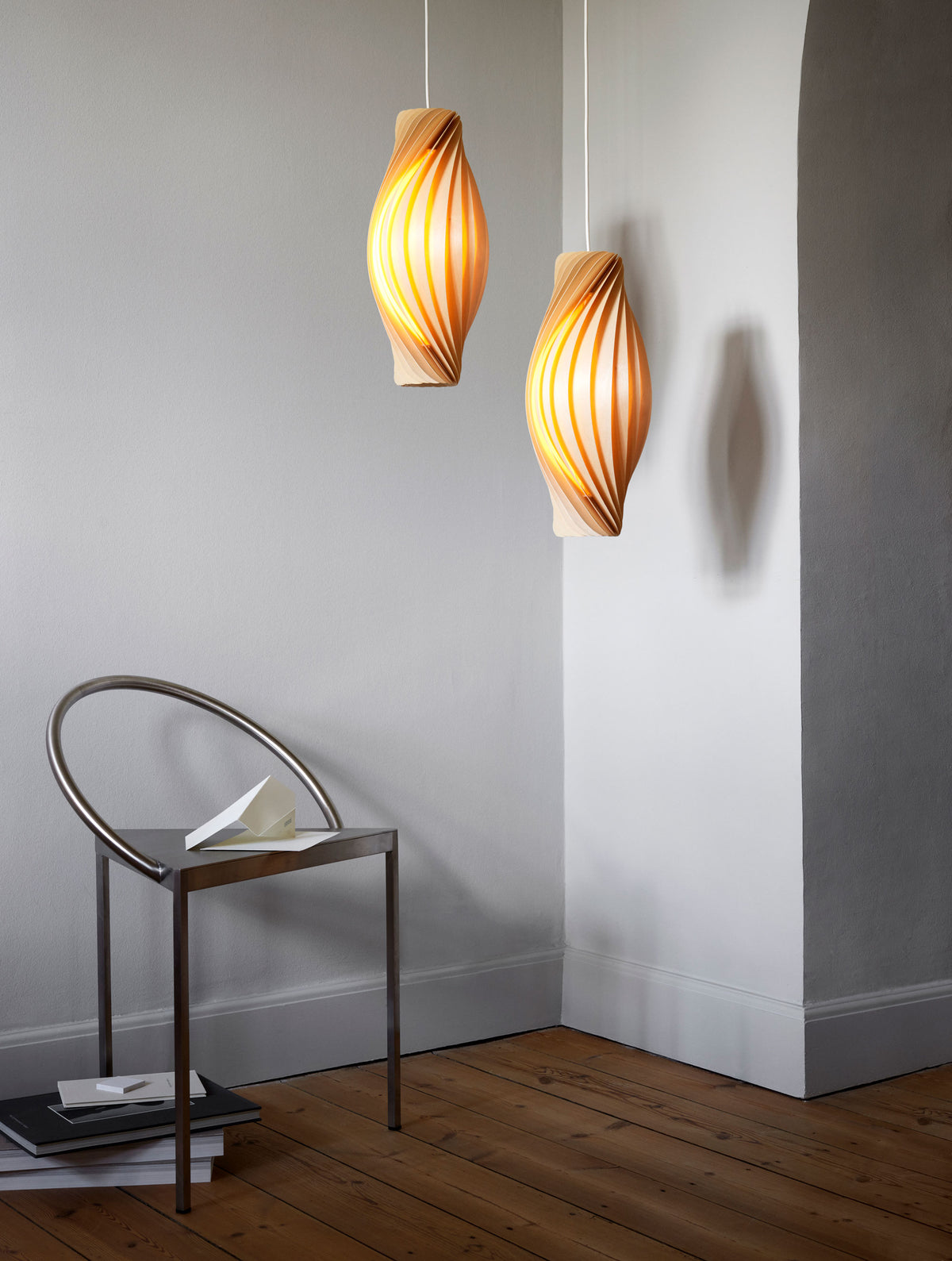 Tom Rossau No.111 pendant light – lit in a living space