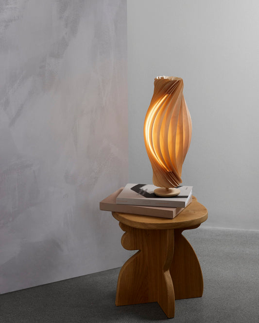 Tom Rossau No.111 table lamp – on a side table