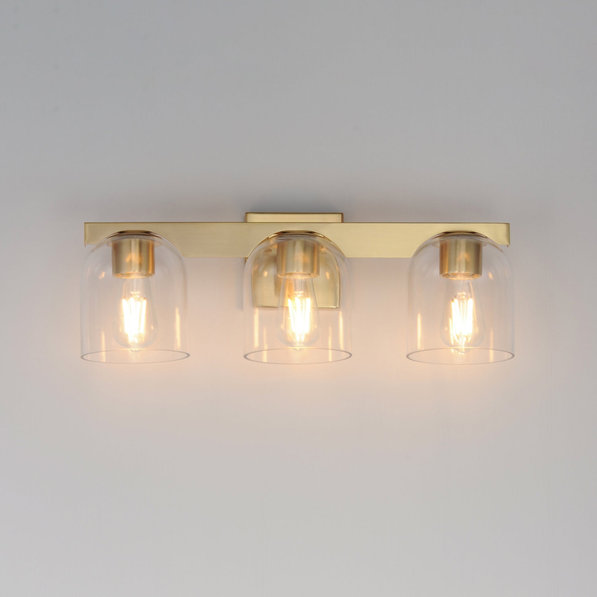 Scoop 3-Light Bath Vanity Natural Aged Brass by Maxim Lighting