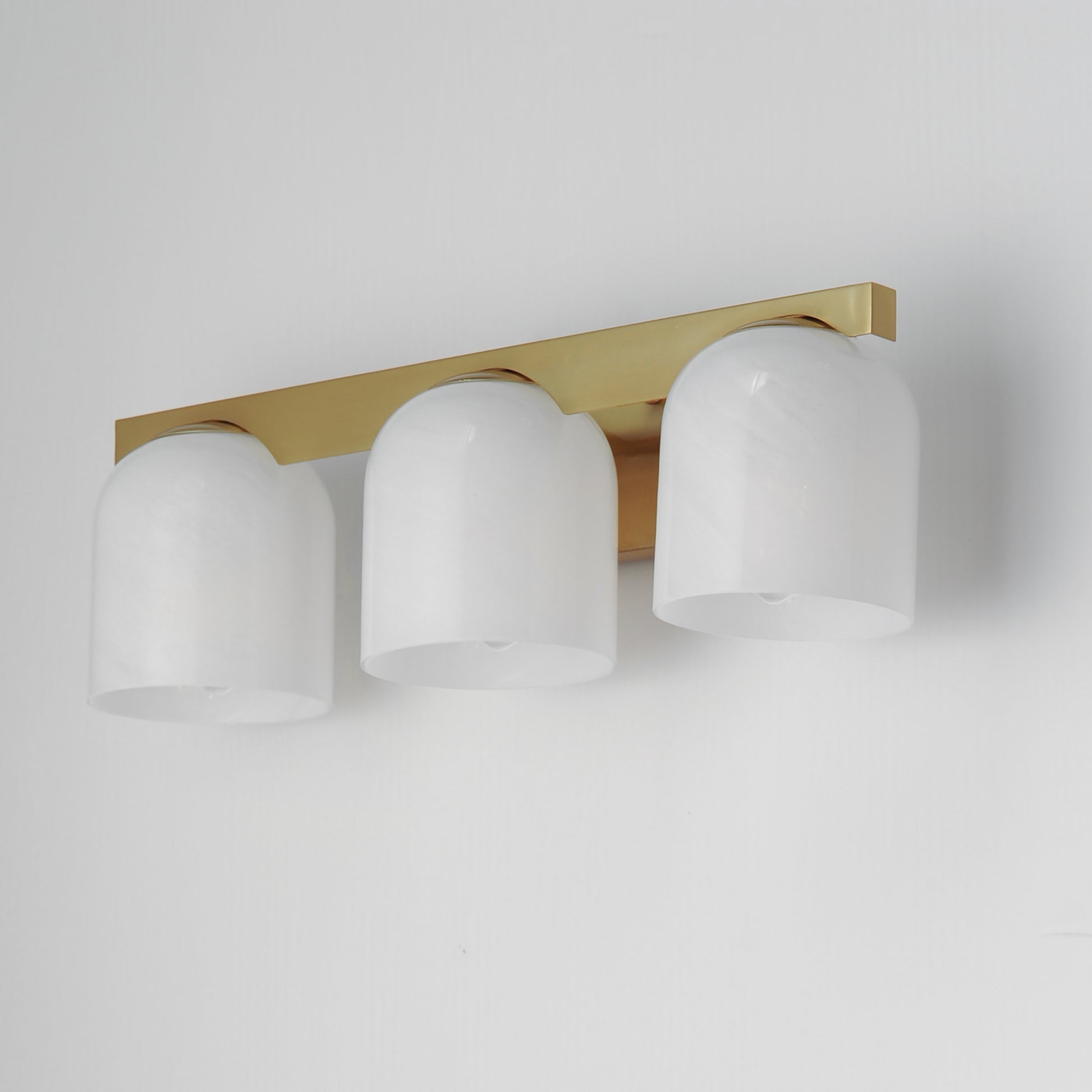 Scoop 3-Light Bath Vanity Natural Aged Brass by Maxim Lighting