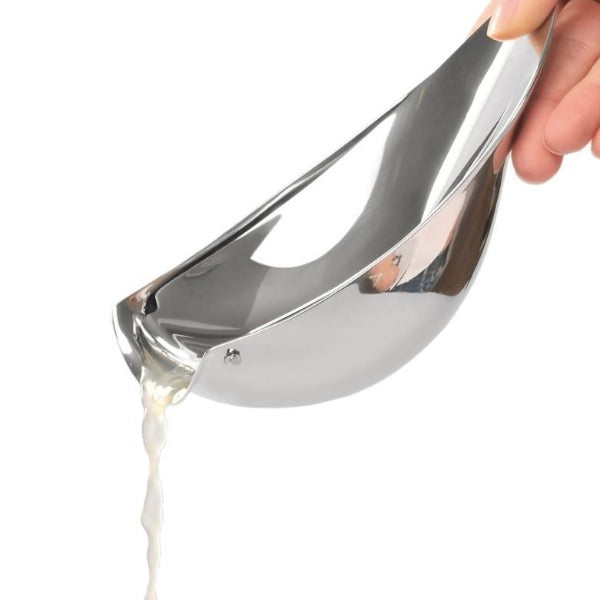 blomus CALLISTA Polished Stainless Steel Lemon Squeezer – CALLISTA lemon squeezer in a styled setting (2)