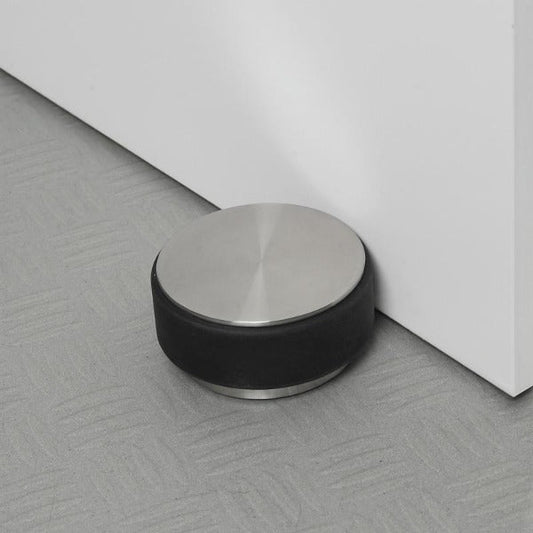 blomus STOP Heavy Steel Floor Door Stop, 2.2 or 4.4 lb – STOP door stop in a styled room (1)