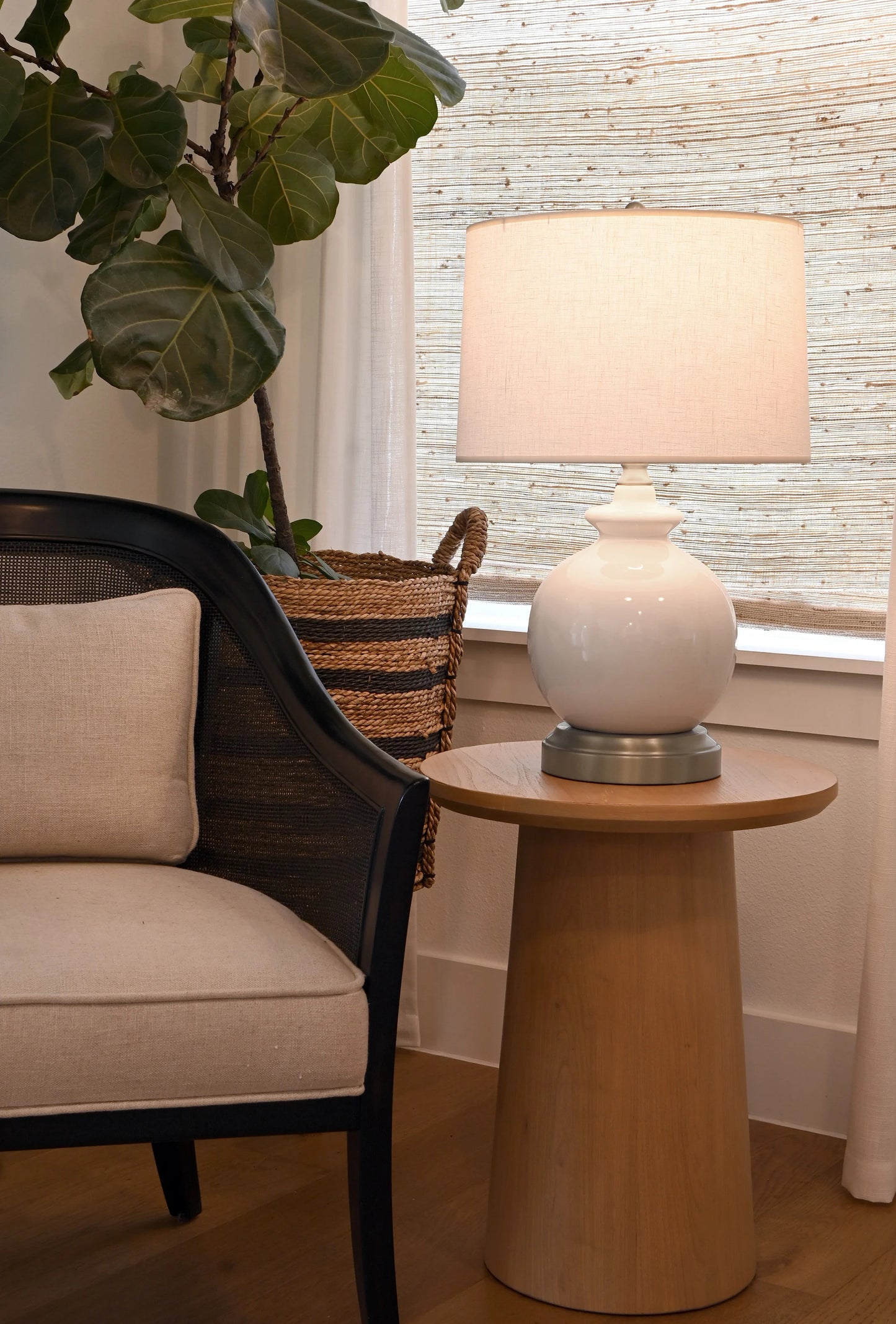 Modern bedside lamp with cordless operation and linen shade