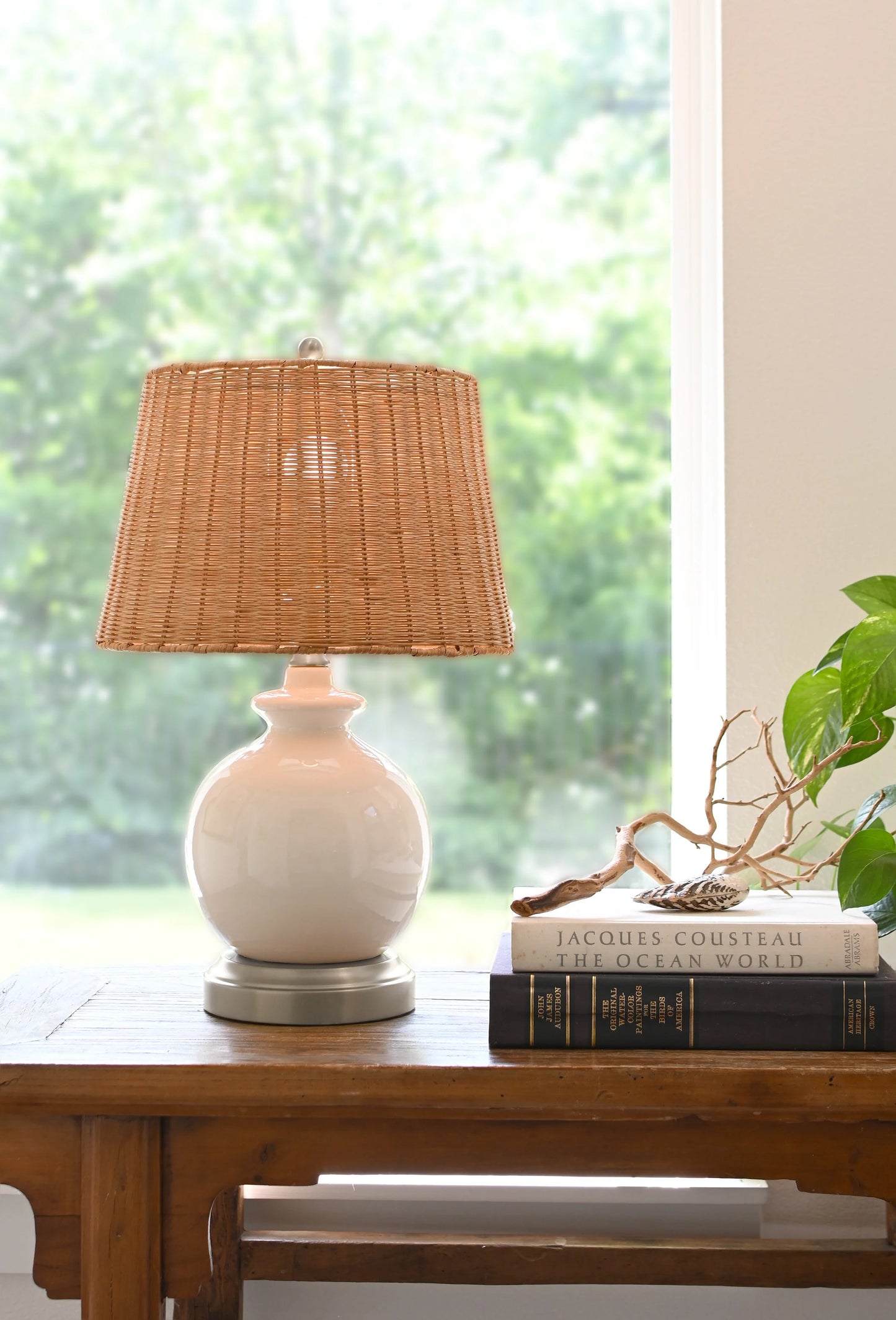 Ivory ceramic accent lamp for hotel suite and hospitality spaces