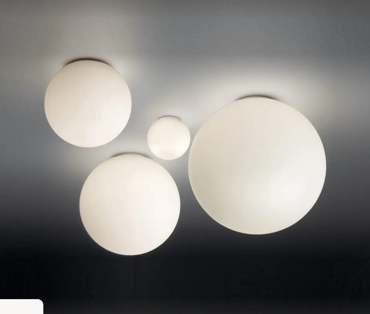 Artemide Dioscuri round glass wall light in white