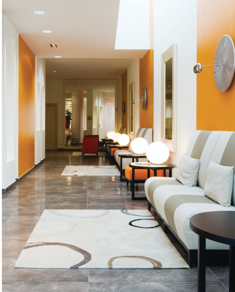 Artemide Dioscuri globe table lamp on office hallway