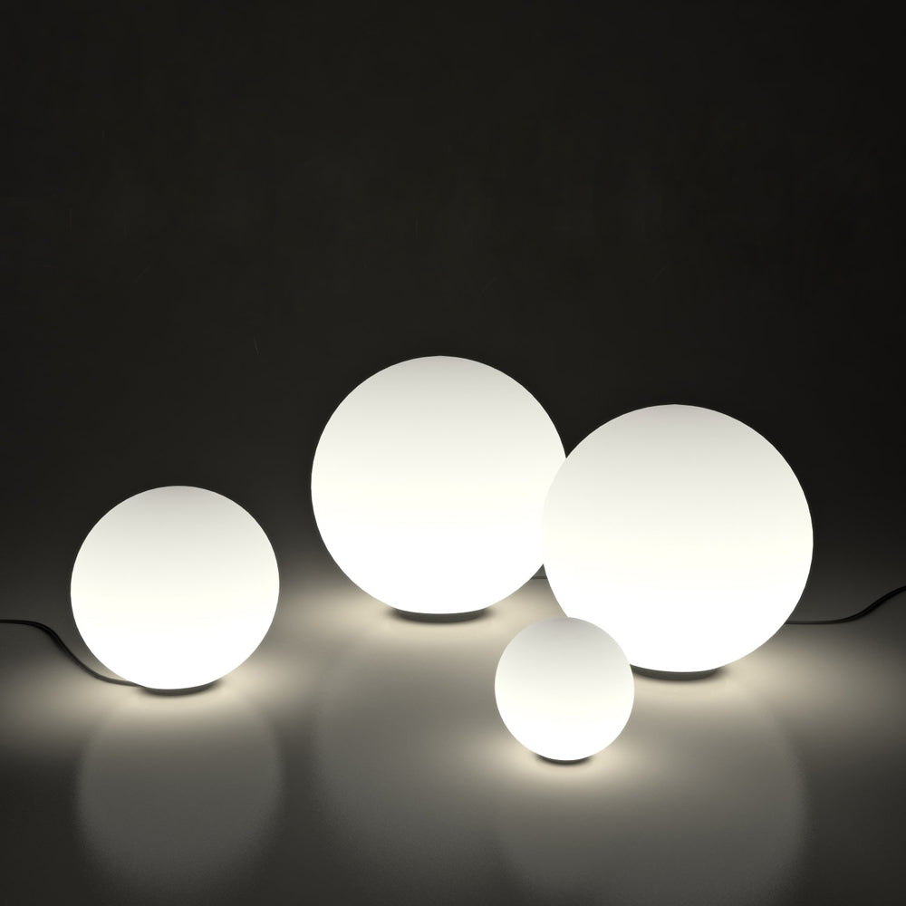 Dioscuri Table Lamp by Artemide with 16.5-inch glass globe