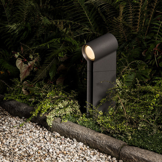 Artemide Oblique Outdoor Bollard Light in a room setting
