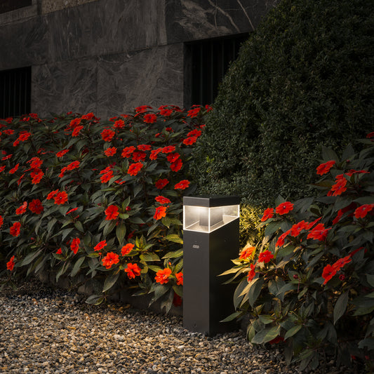 Artemide Tetragono Outdoor Bollard Light in a room setting