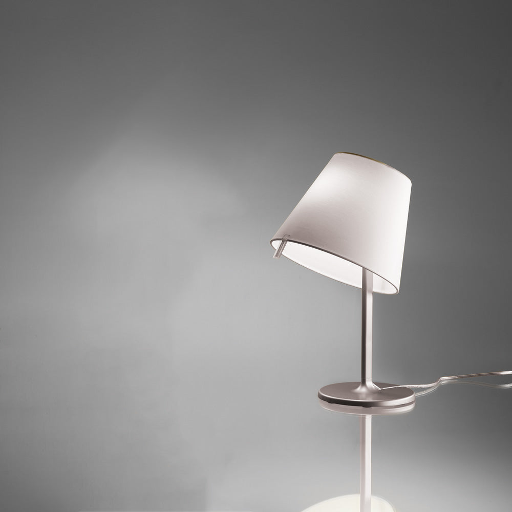 Illuminate Your Space with Artemide's Finest - Grey Melampo Table Lamp