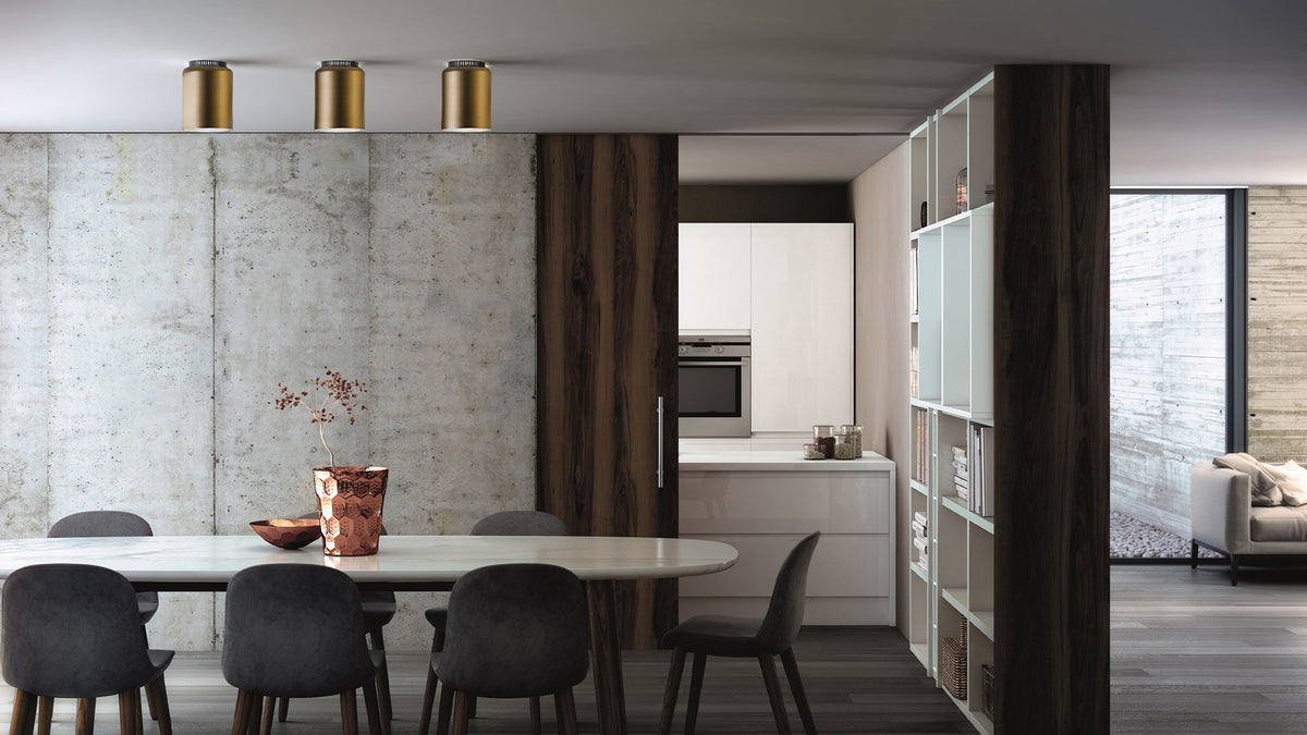 Aspen C ceiling lamps in brass over a dining table