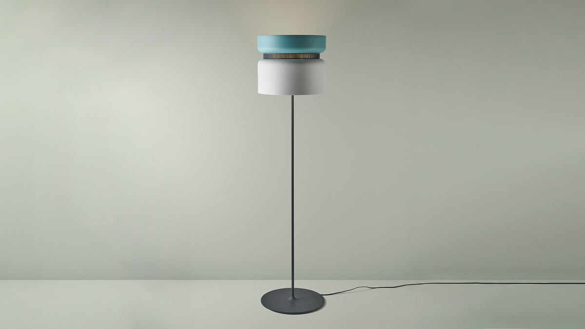 B.lux Aspen floor lamp with an aqua top shade and white bottom shade, studio view