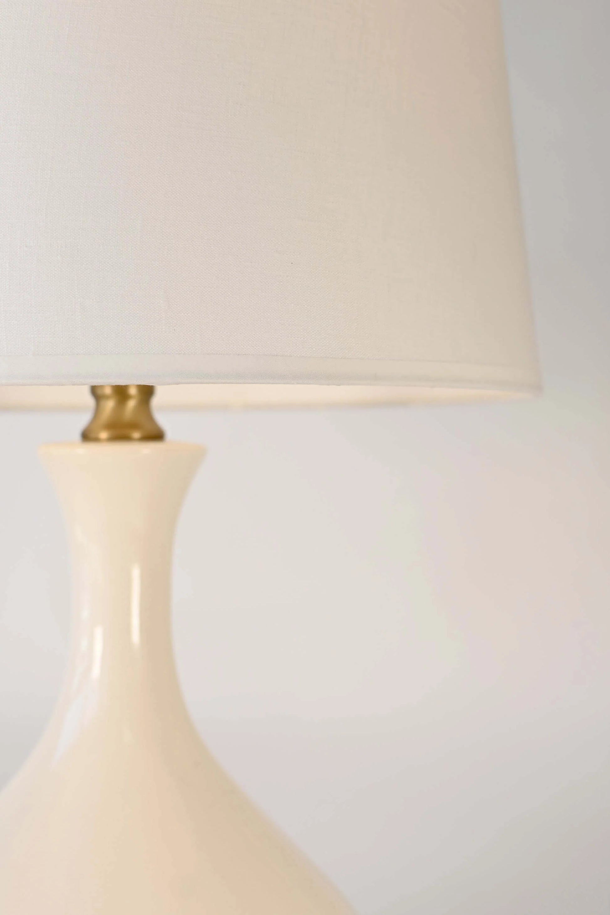 Antique brass and ivory ceramic cordless lamp for elegant interiors