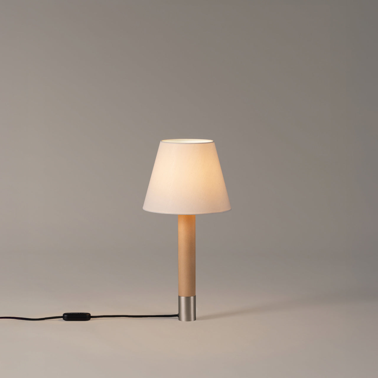 Stylish Santa & Cole Basica M1 table lamp ideal for modern home office and bedside lighting in white linen shade