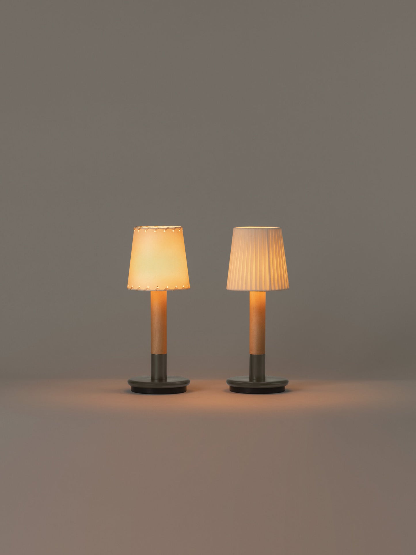 Rechargeable LED lamp with touch-sensitive graphite base
