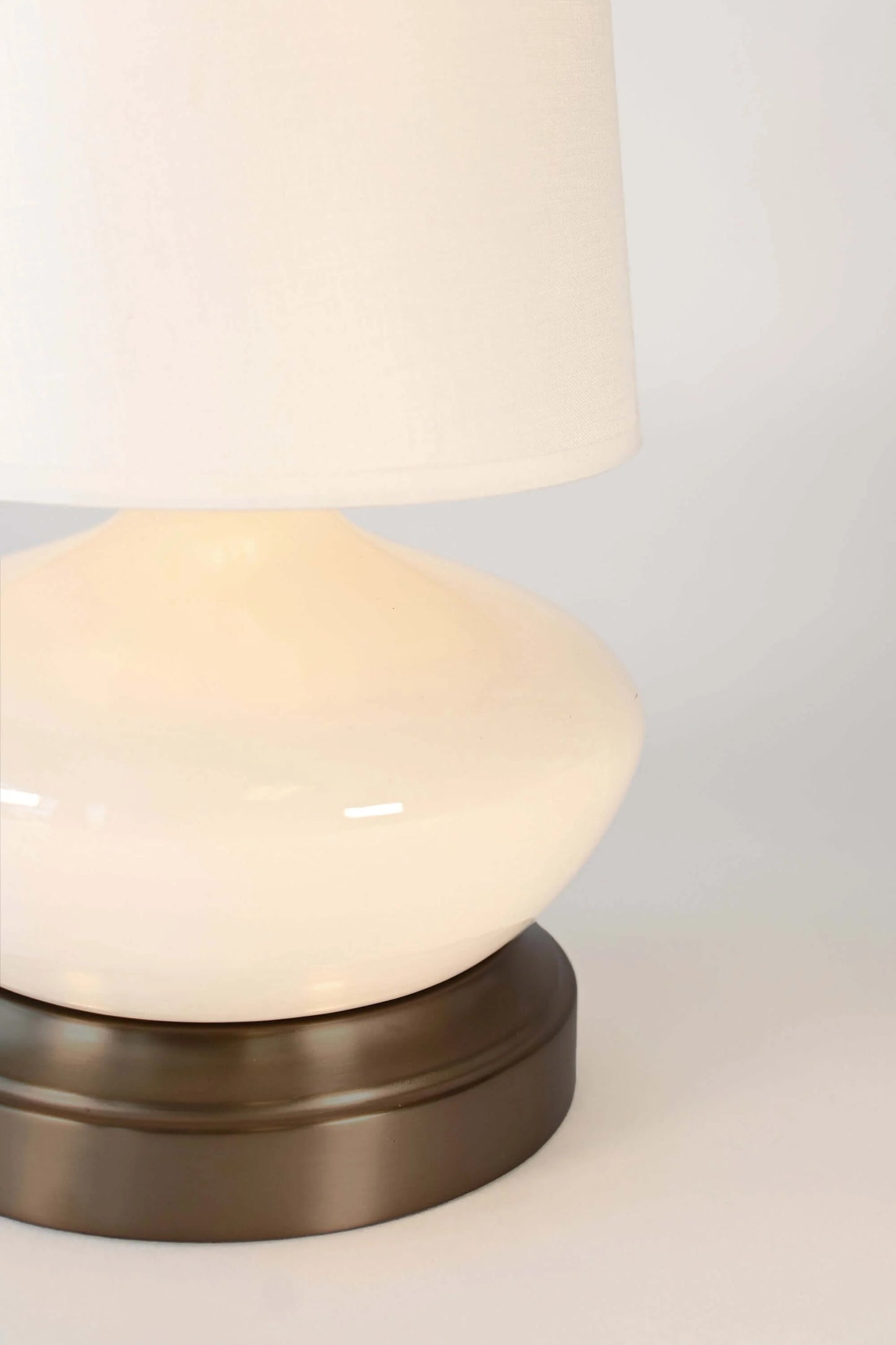 Luxury cordless table lamp with antique brass accents and LED bulb