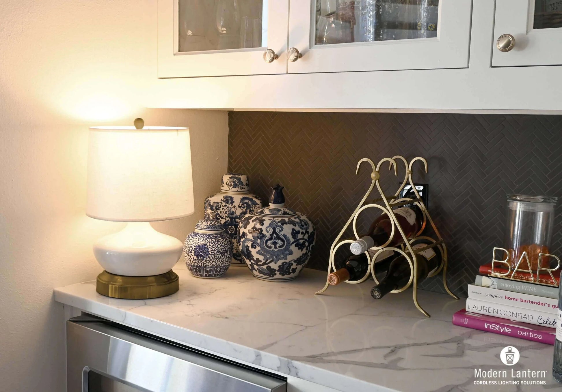 Bella rechargeable table lamp with ivory ceramic base for hotel interiors