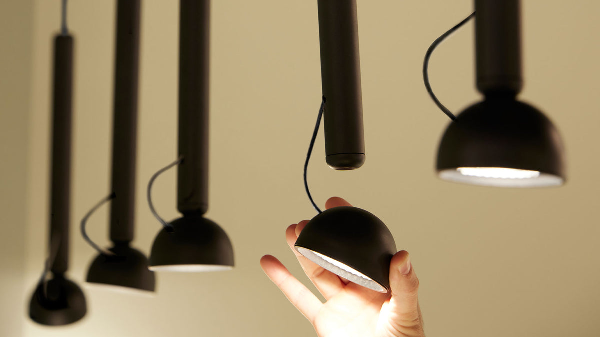 Berry S pendant lamps above a table