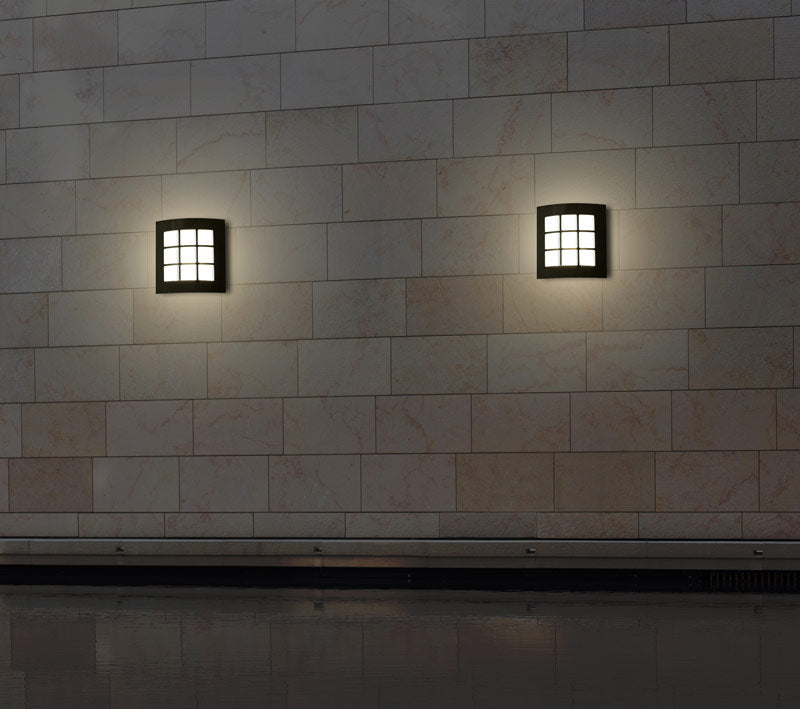 Square LED wall sconce designed for indoor and outdoor applications
