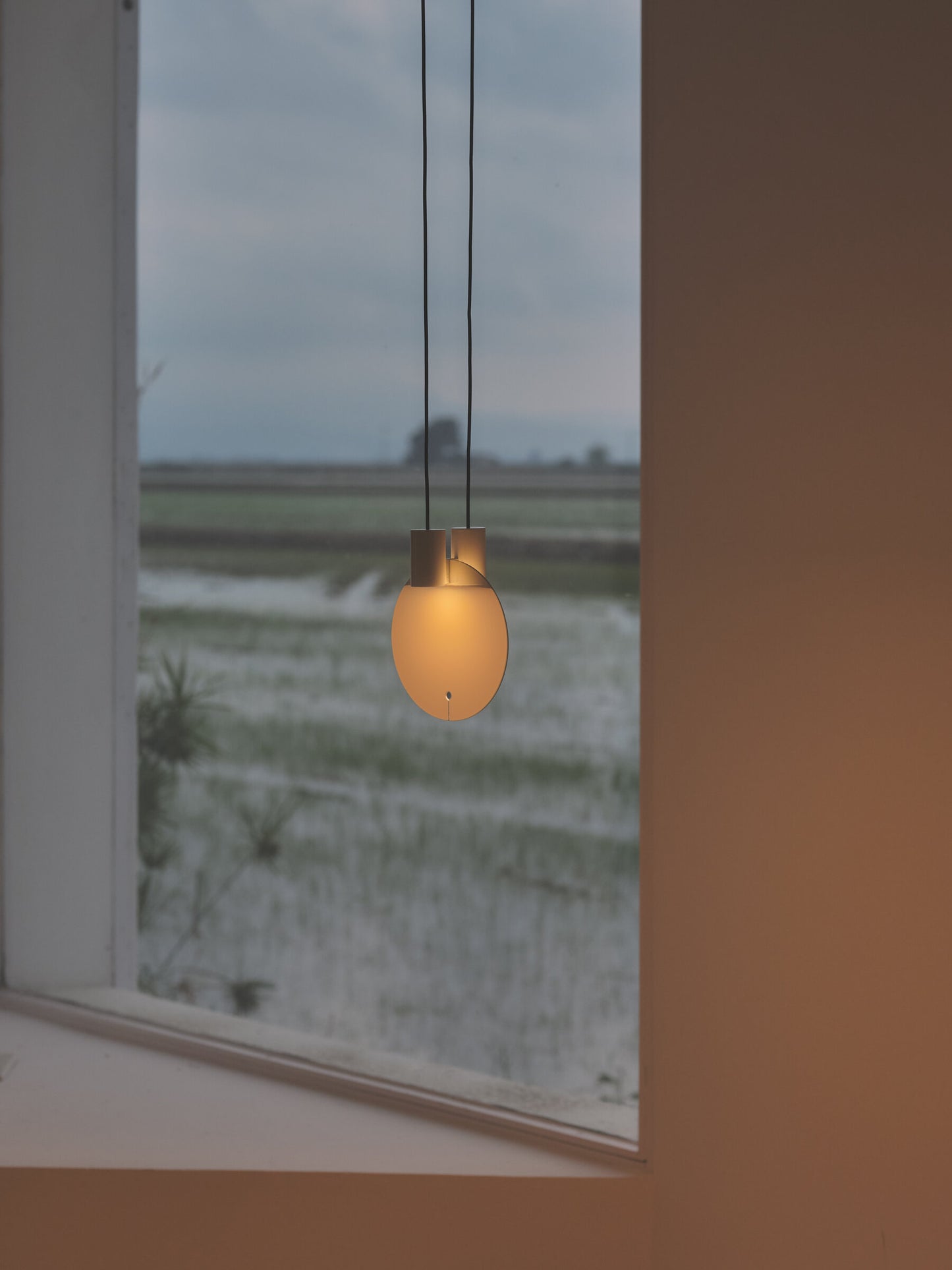 High-end glossy creme white pendant lamp for modern dining spaces