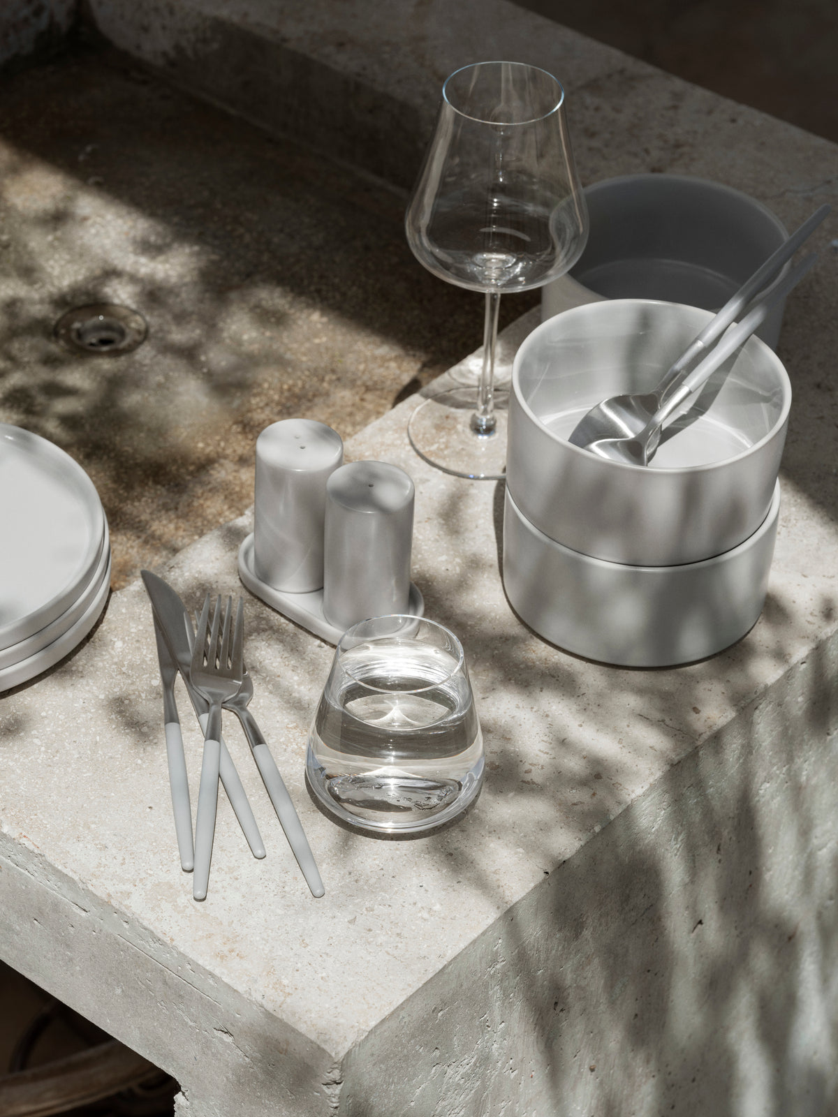 blomus BELO White Wine Glasses 13.5 oz, Set of 2 – clear BELO glass on a sunlit stone table