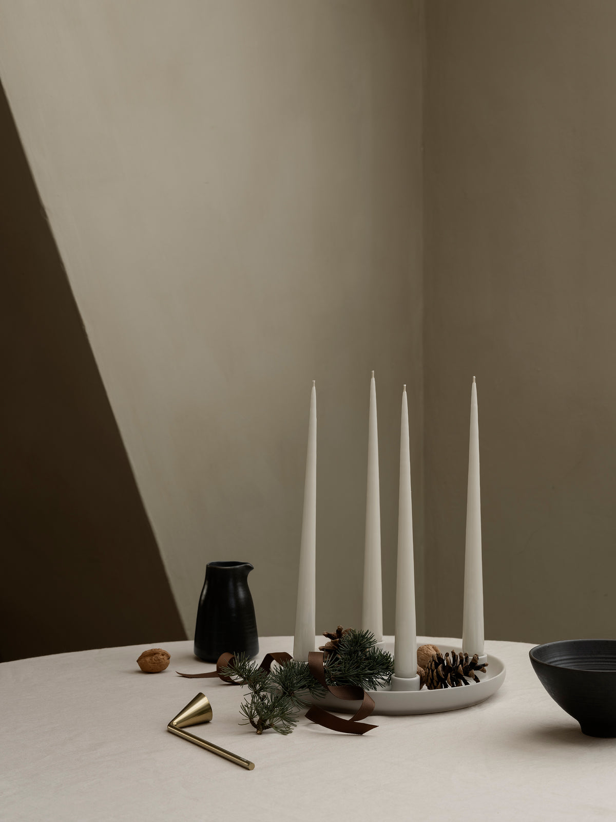 blomus KUMI Stoneware Creamer, 9.8 oz – Espresso creamer on a table with taper candles