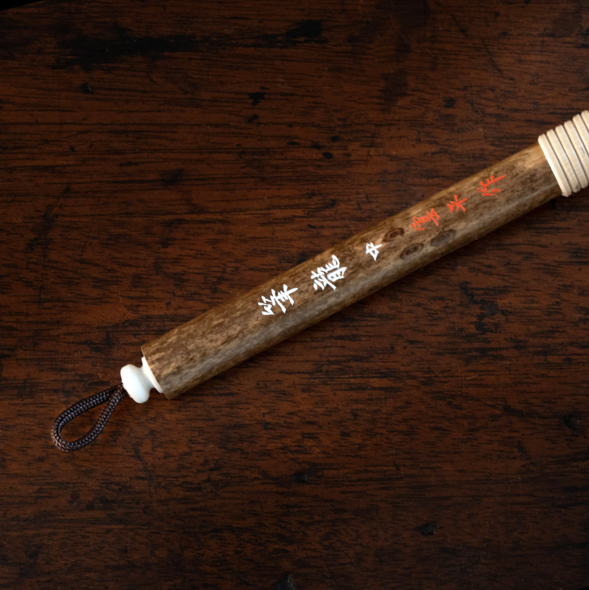 Umpei Fude Calligraphy Brush D with Gift Box, Hankeido – handle detail on dark wood