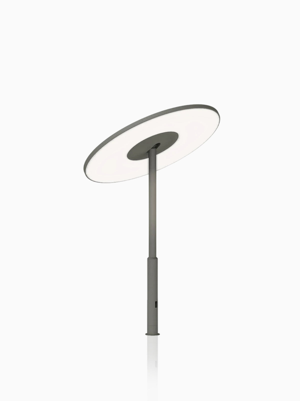 Circa Grommet in graphite, desk-mount stem and tilting disc, studio view