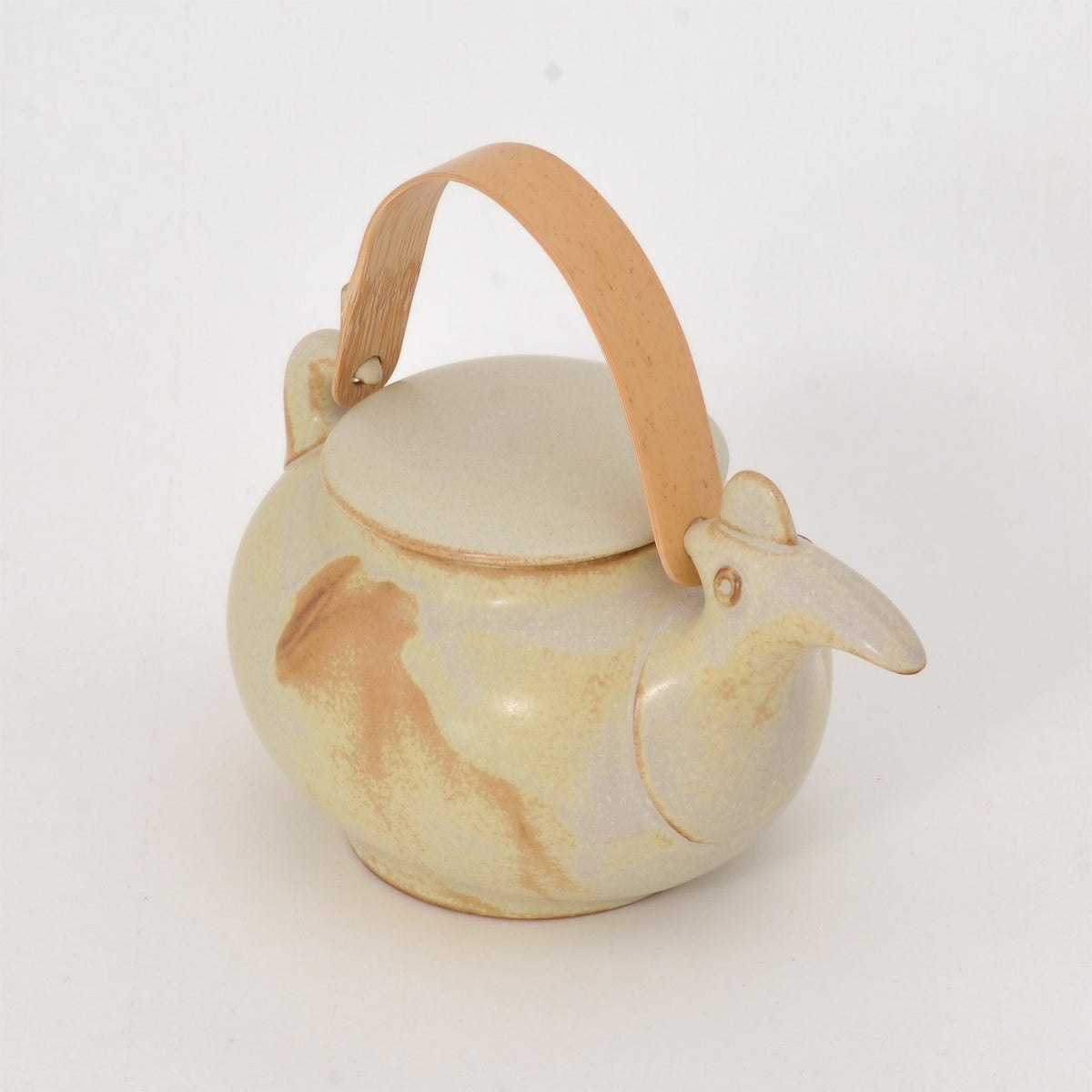 Ceramic Japan Tori Bird Teapot – angled view of the bamboo handle