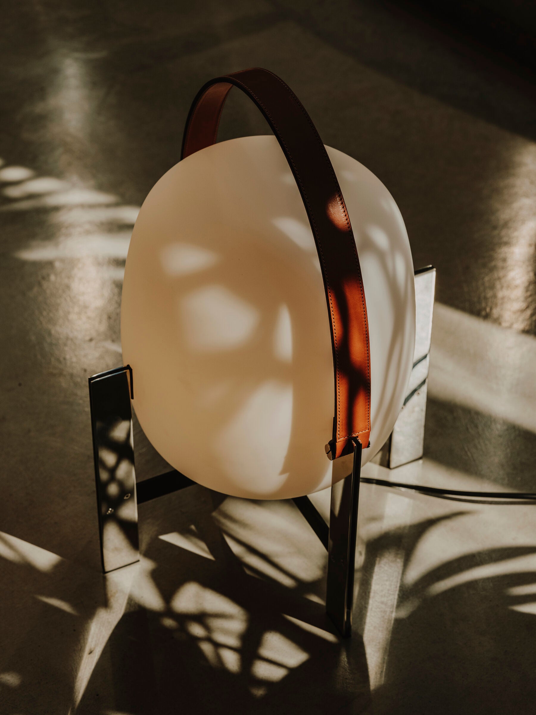 Cesta Metalica table lamp with optional leather carrying handle