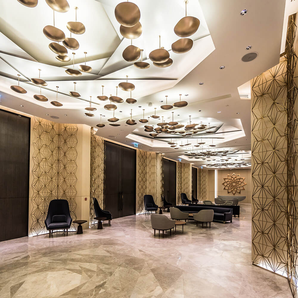 Chestnut single LED wall and ceiling light by Viso in a lifestyle setting, view 1